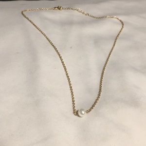 a fake pearl necklace